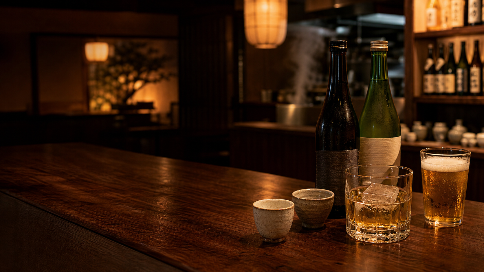 Sake, whisky, and beer set on the bar at Yamamoto